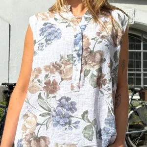 Dorota top med knapstolpe og blomster mønster hvid LikeLondon